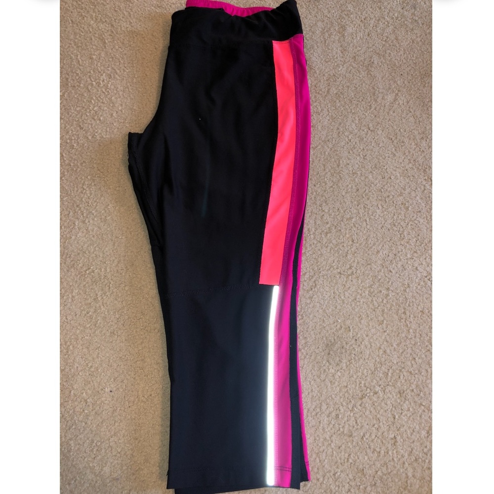 Black crop leggings with neon pink & orange side